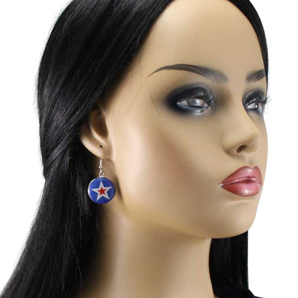 Model wearing a dangling blue earring with a red star design - Lilylin Designs