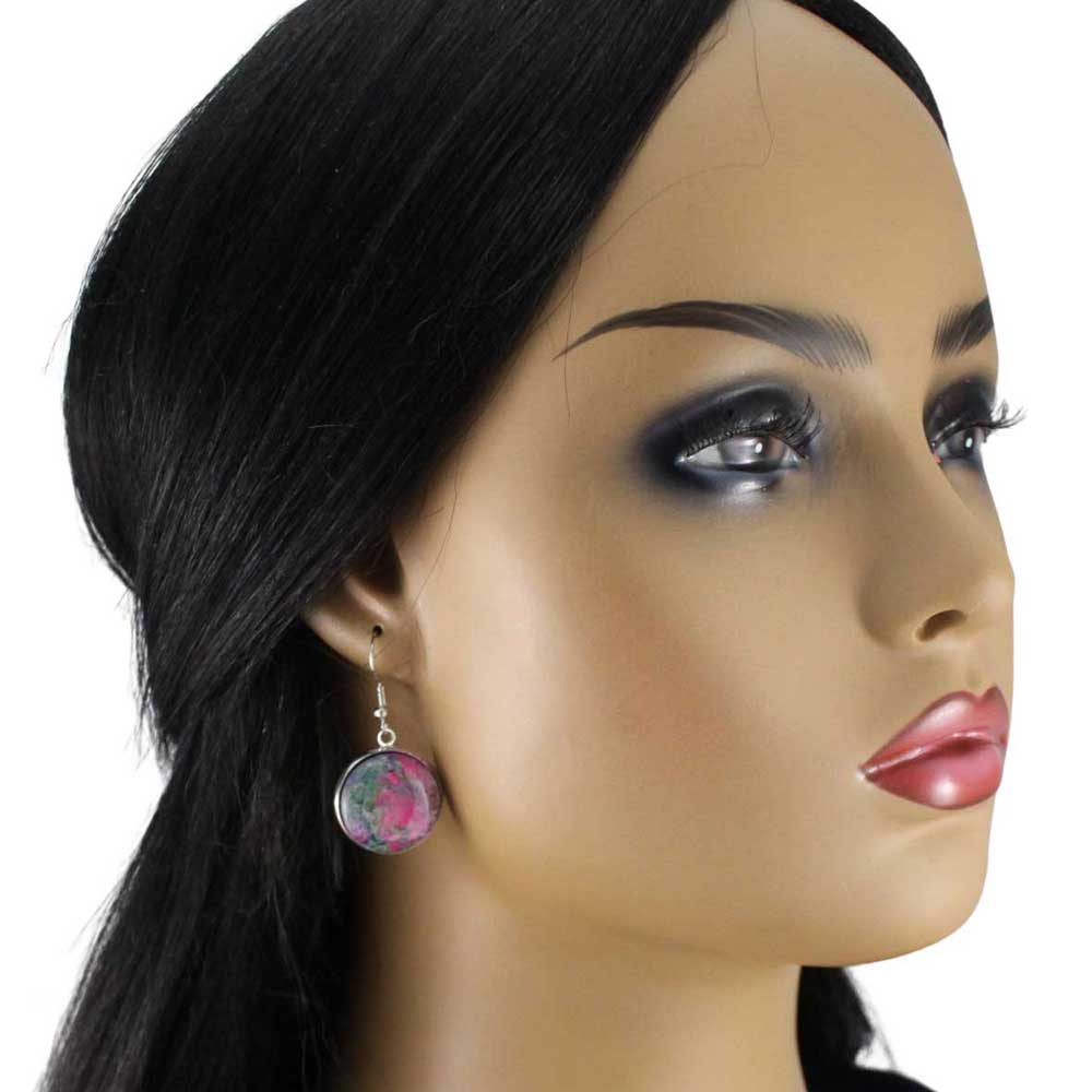 Model wearing Round earrings with colorful marbled design on a white background | Lilylin Designs