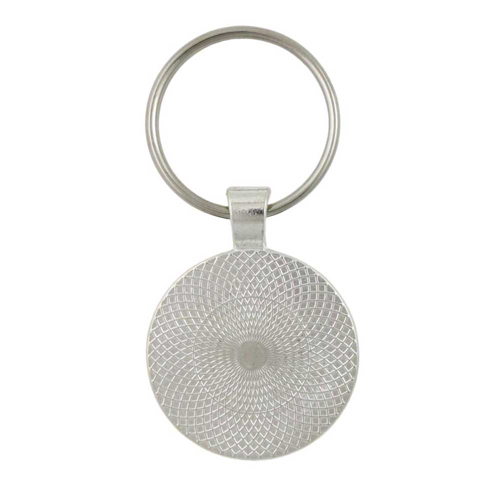 Silver keychain with textured circular pendant on a white background - Lilylin Designs