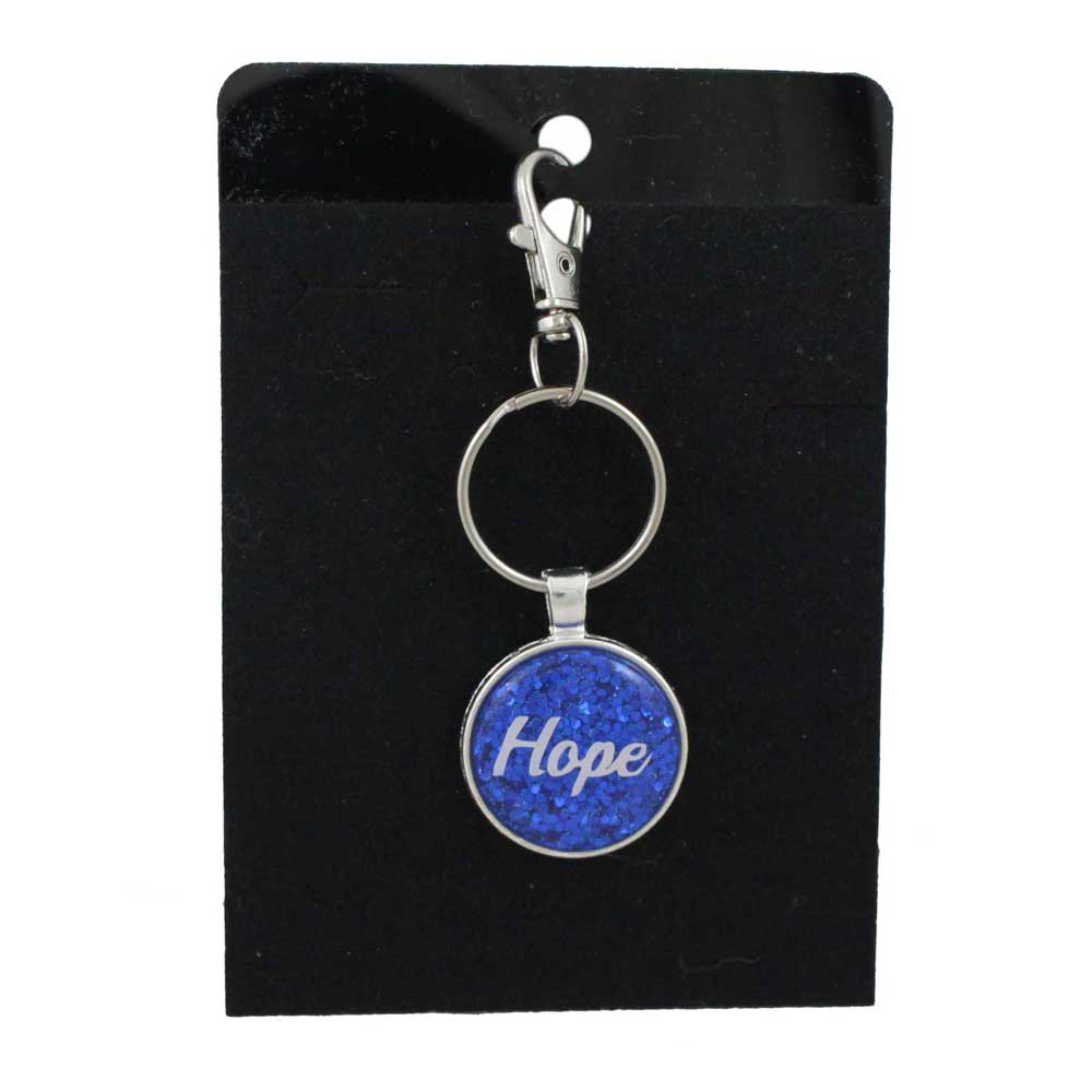 Keychain with blue glittery disc and 'Hope' text on a black card - Lilylin Designs