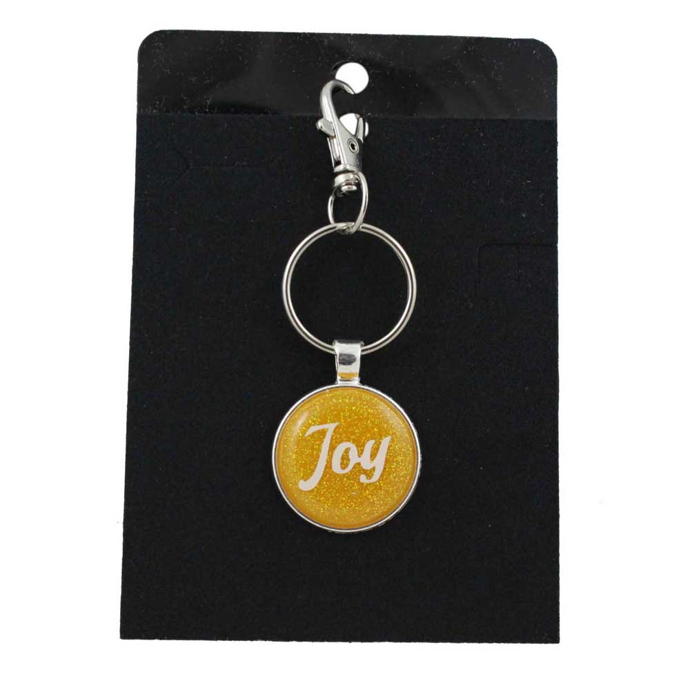 Keychain with 'Joy' on a yellow glittery disc, on a black card - Lilylin Designs