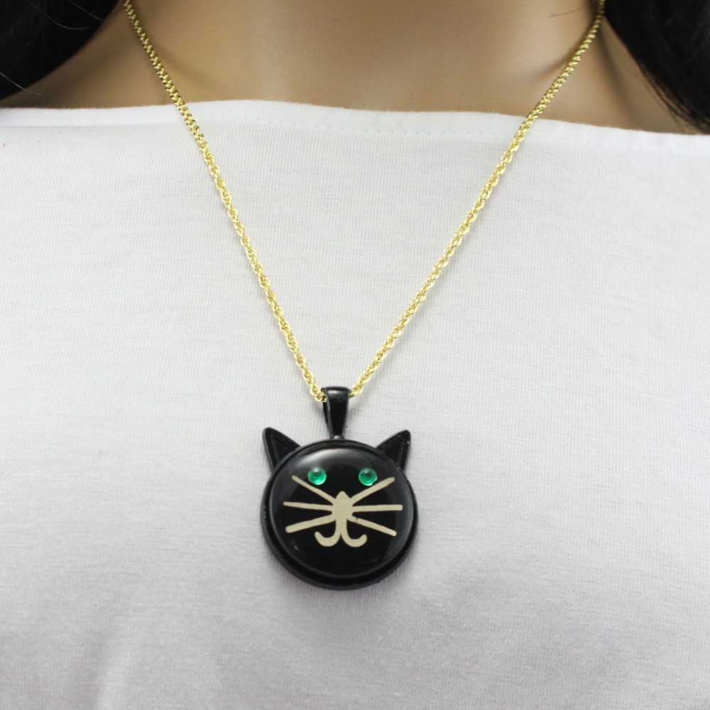 Black cat-shaped pendant necklace on a model - Lilylin Designs