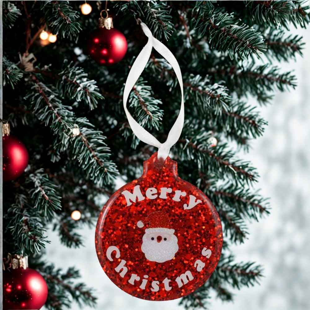 Red glittery Christmas ornament with 'Merry Christmas' text and Santa Claus face, hanging on a tree | Lilylin Designs