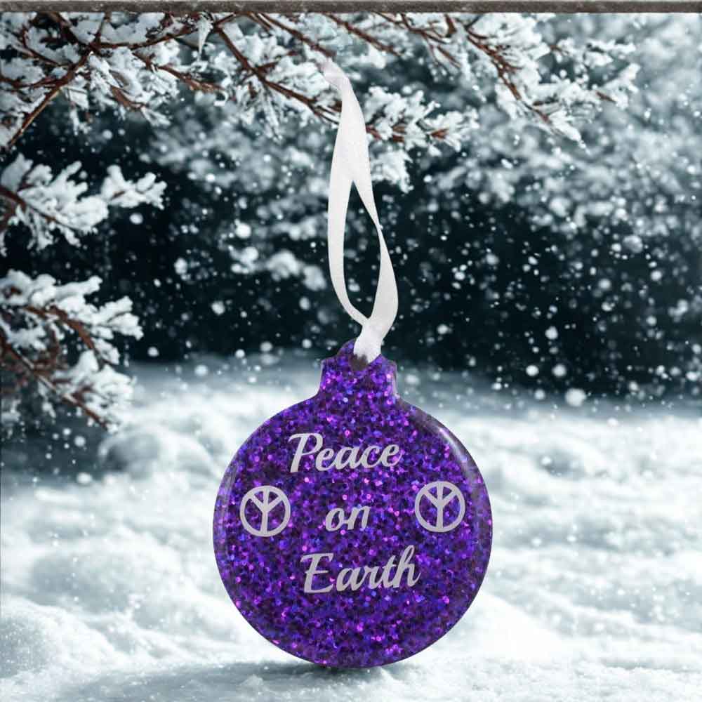 Purple glitter ornament with 'Peace on Earth' text against a snowy background | Lilylin Designs