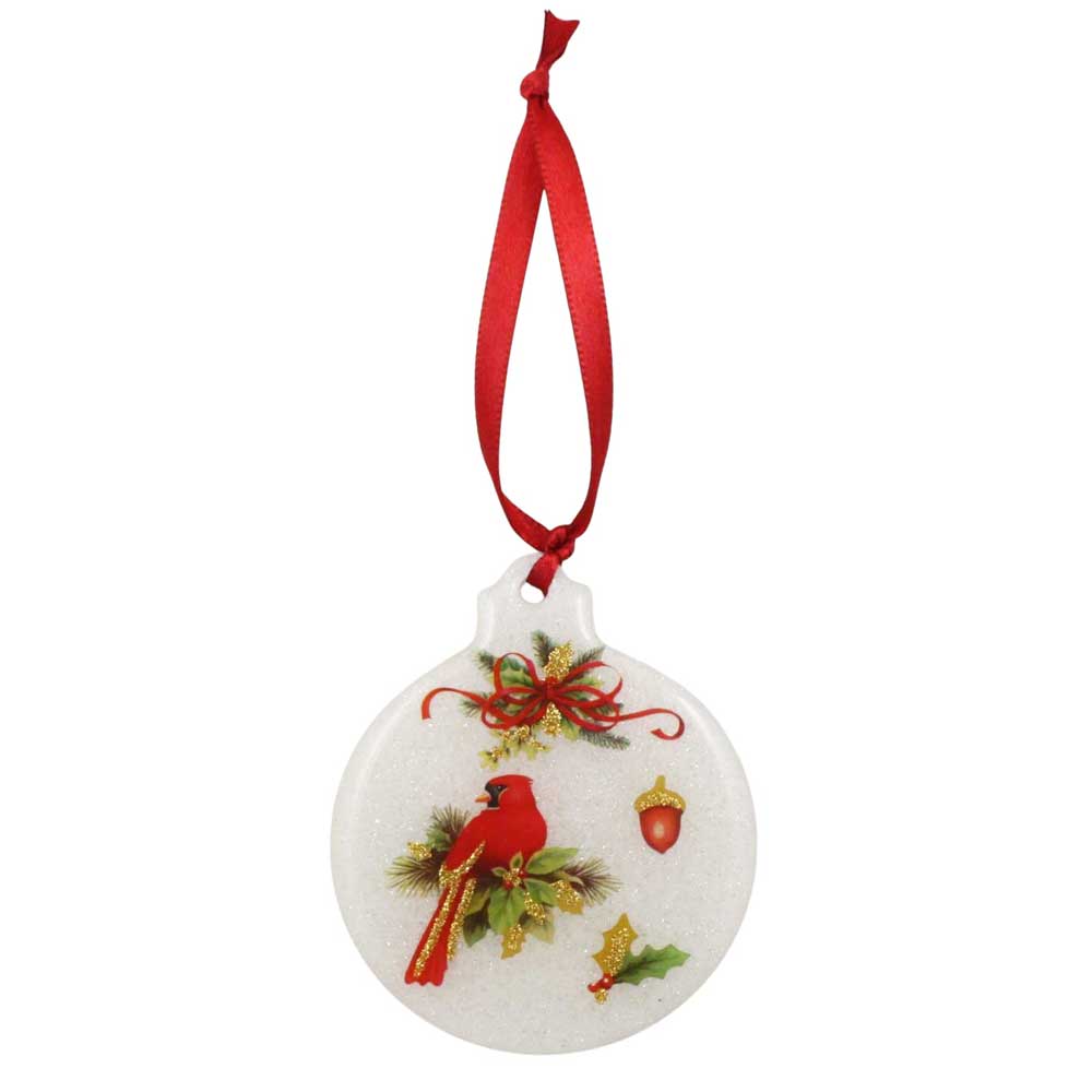 Round Christmas ornament with a cardinal bird design on a white background | Lilylin Designs