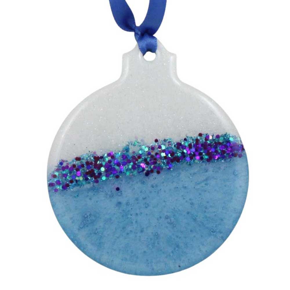 Round blue and white ornament with glittery center and blue ribbon on a white background | Lilylin Designs