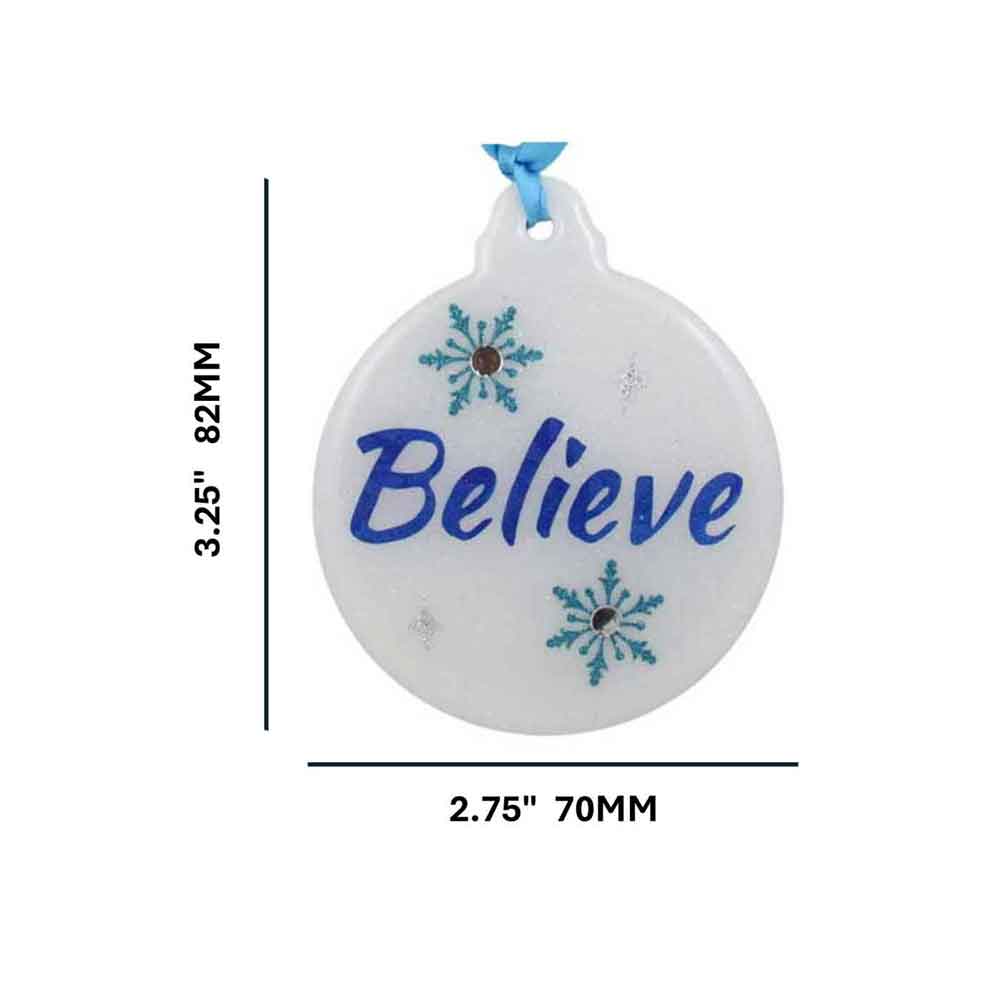 Round white ornament with 'Believe' text and snowflake designs, shown with measurements on a white background. | Lilylin Designs