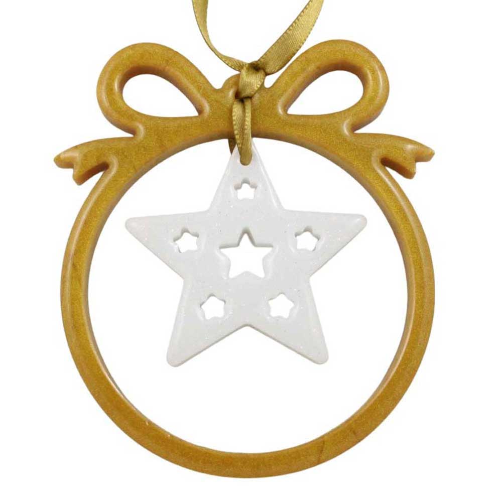 Gold colored open bow with white star resin ornament on white background | Lilylin Designs