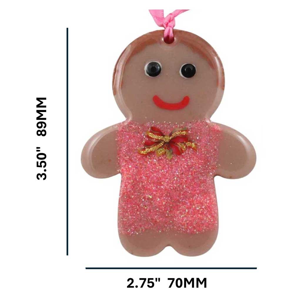 Decorative gingerbread girl ornament with pink dress and Christmas bow on a white background with measurements | Lilylin Designs