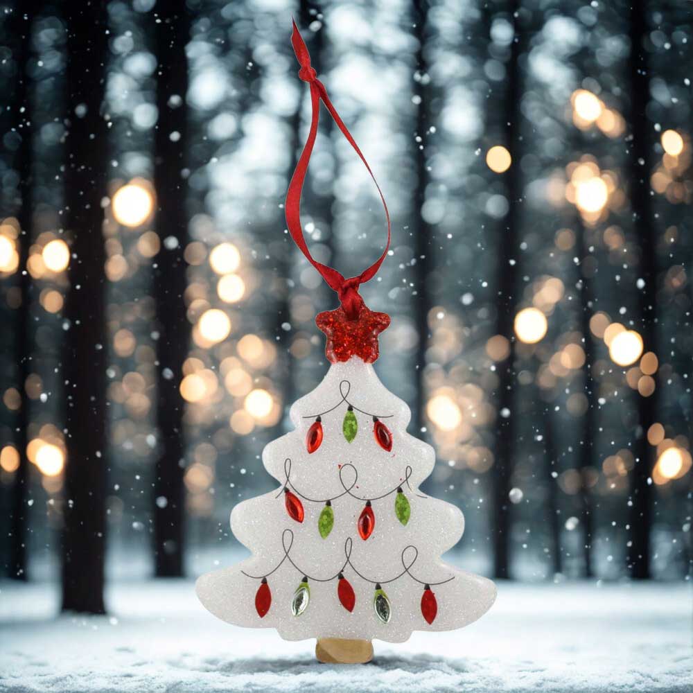 Decorative Christmas tree ornament with red and green lights against a snowy forest background | Lilylin Designs