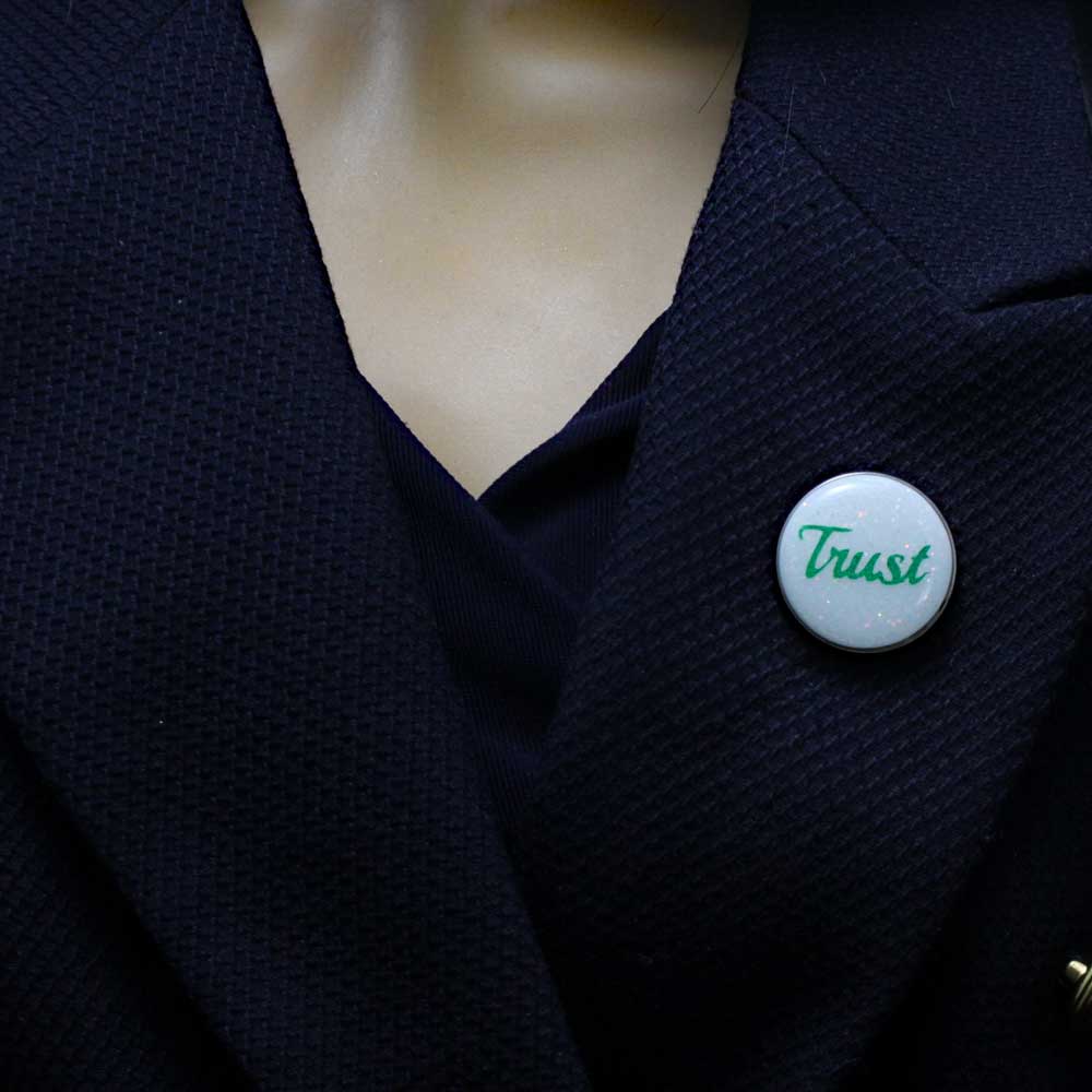 White Disc with Green Trust Lapel Pin - Lilylin Designs