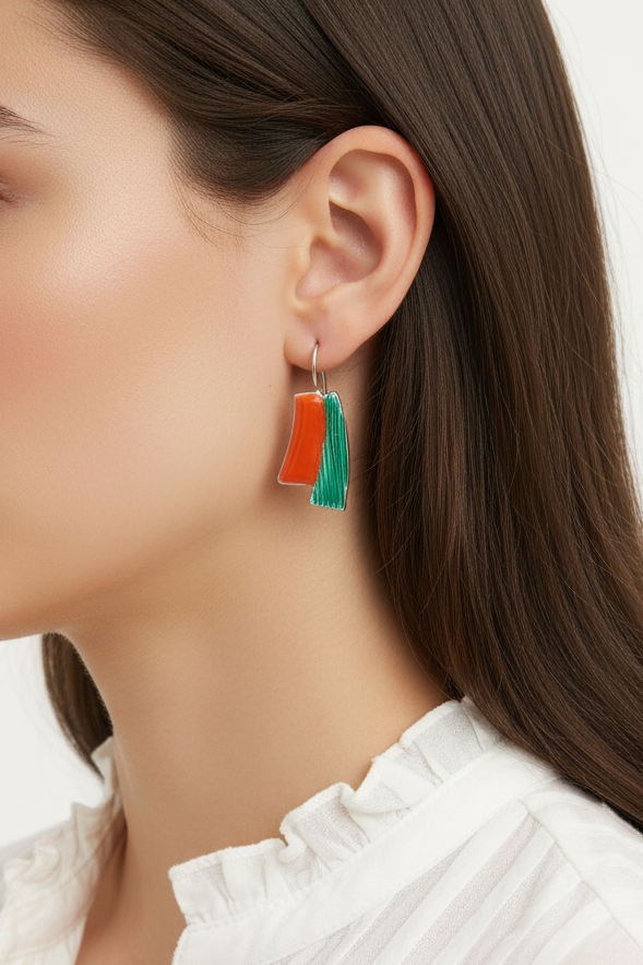 Model wearing red and green enamel dangle earring- Lilylin Designs