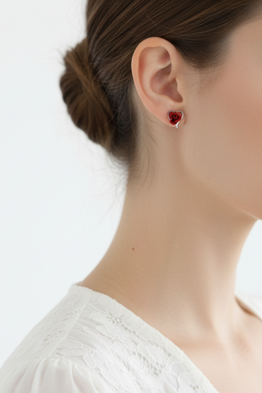 Model wearing silver heart with red rose earring - Lilylin Designs