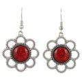 Pair of earrings with red circular stones and silver floral daisy on a white background - Lilylin Designs