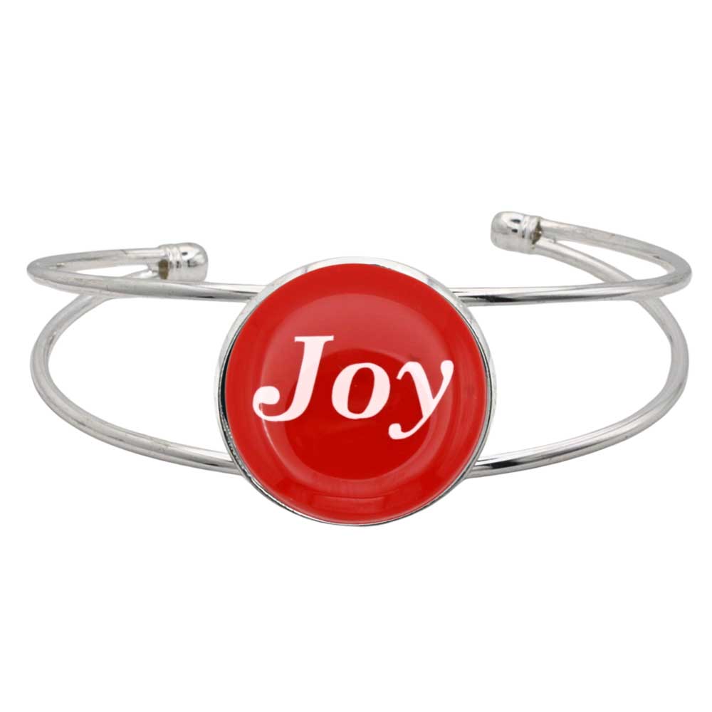 A silver-toned metal cuff bracelet featuring a round red center cabochon with the word 'Joy' written in white script, shown on a plain white background - Lilylin Designs