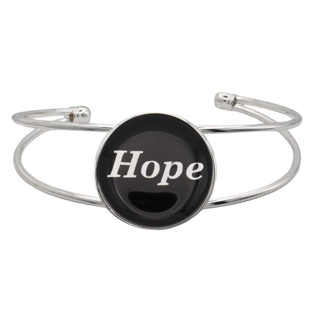 A silver-toned metal cuff bracelet featuring a round black disc with the word 'Hope' printed in white script, shown on a plain white background – Lilylin Designs