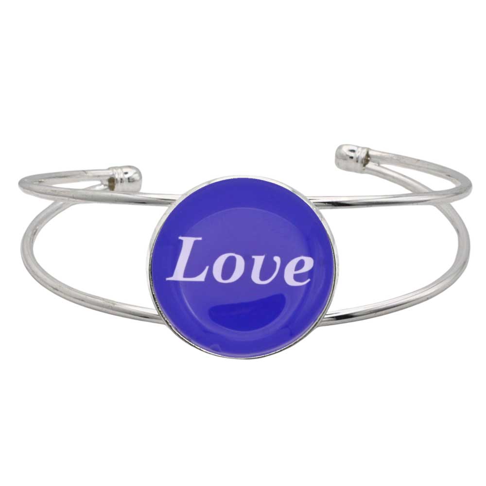 A silver-toned metal cuff bracelet featuring a round blue disc with the word 'Love' printed in white script, shown on a plain white background – Lilylin Designs