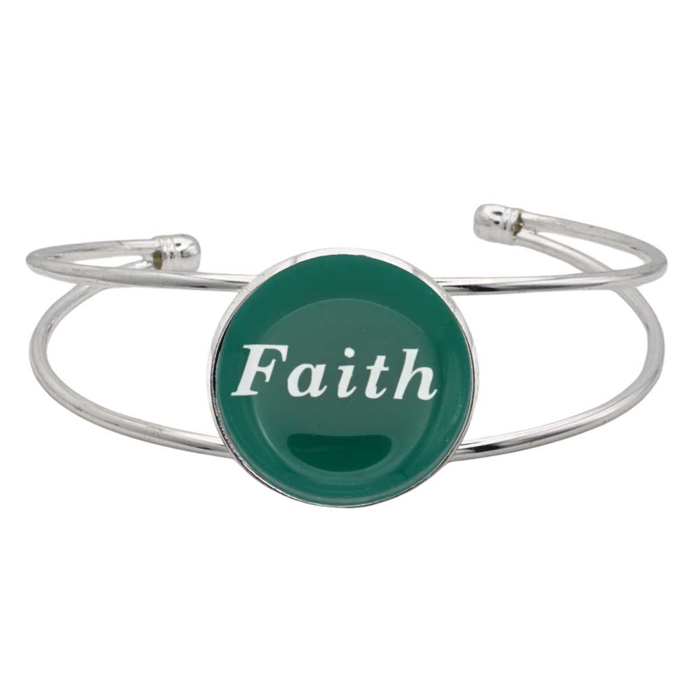 A silver-toned metal cuff bracelet featuring a round green disc with the word 'Faith' printed in white script, shown on a plain white background – Lilylin Designs