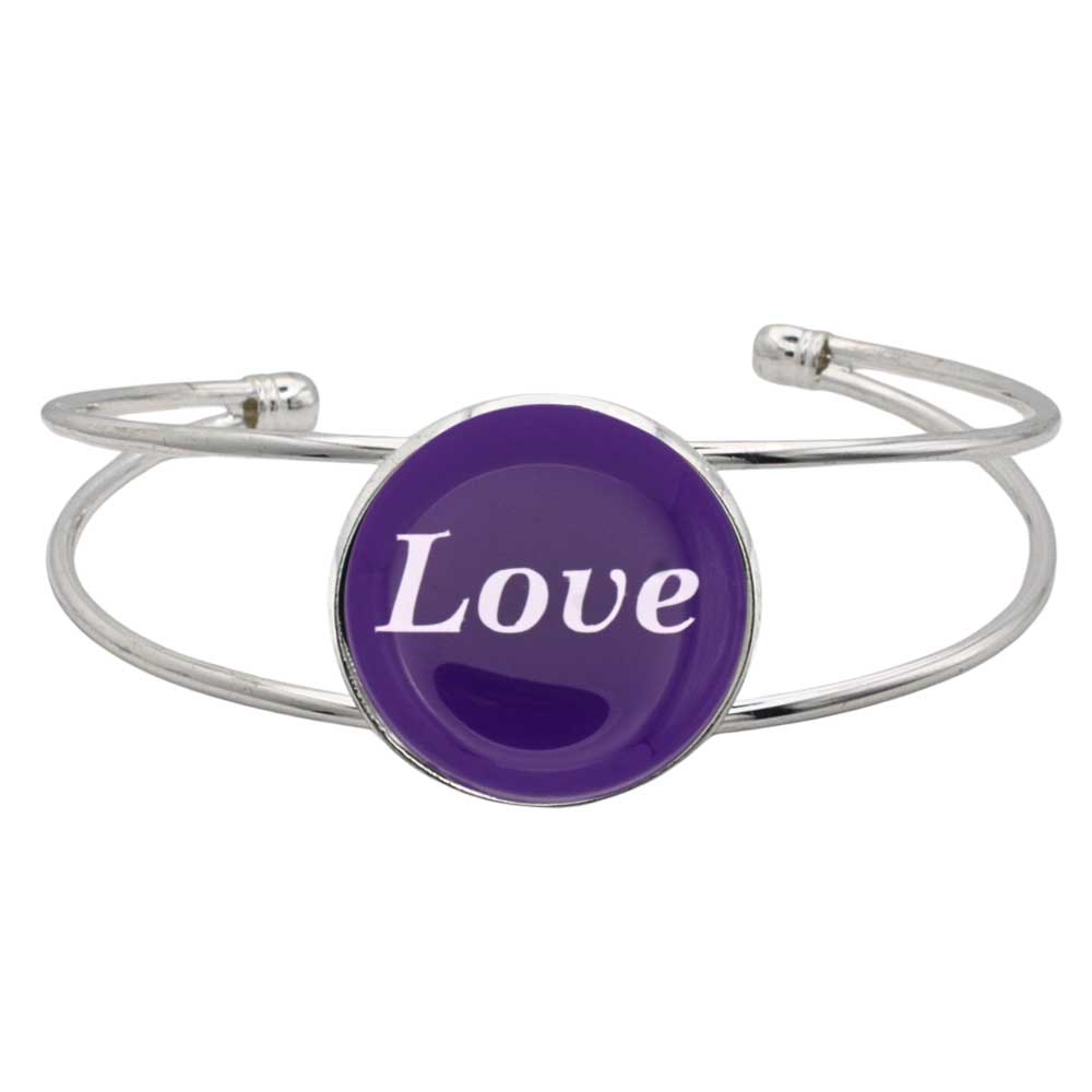 A silver-toned metal cuff bracelet featuring a round purple disc with the word 'Love' printed in white script, shown on a plain white background – Lilylin Designs