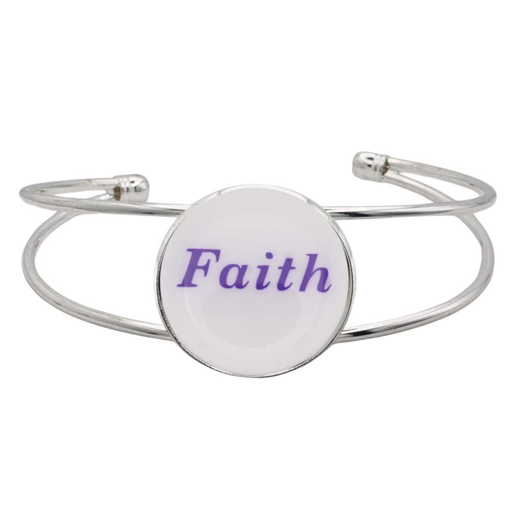 A silver-toned metal cuff bracelet featuring a round white disc with the word “Faith” printed in purple script, shown on a plain white background – Lilylin Designs