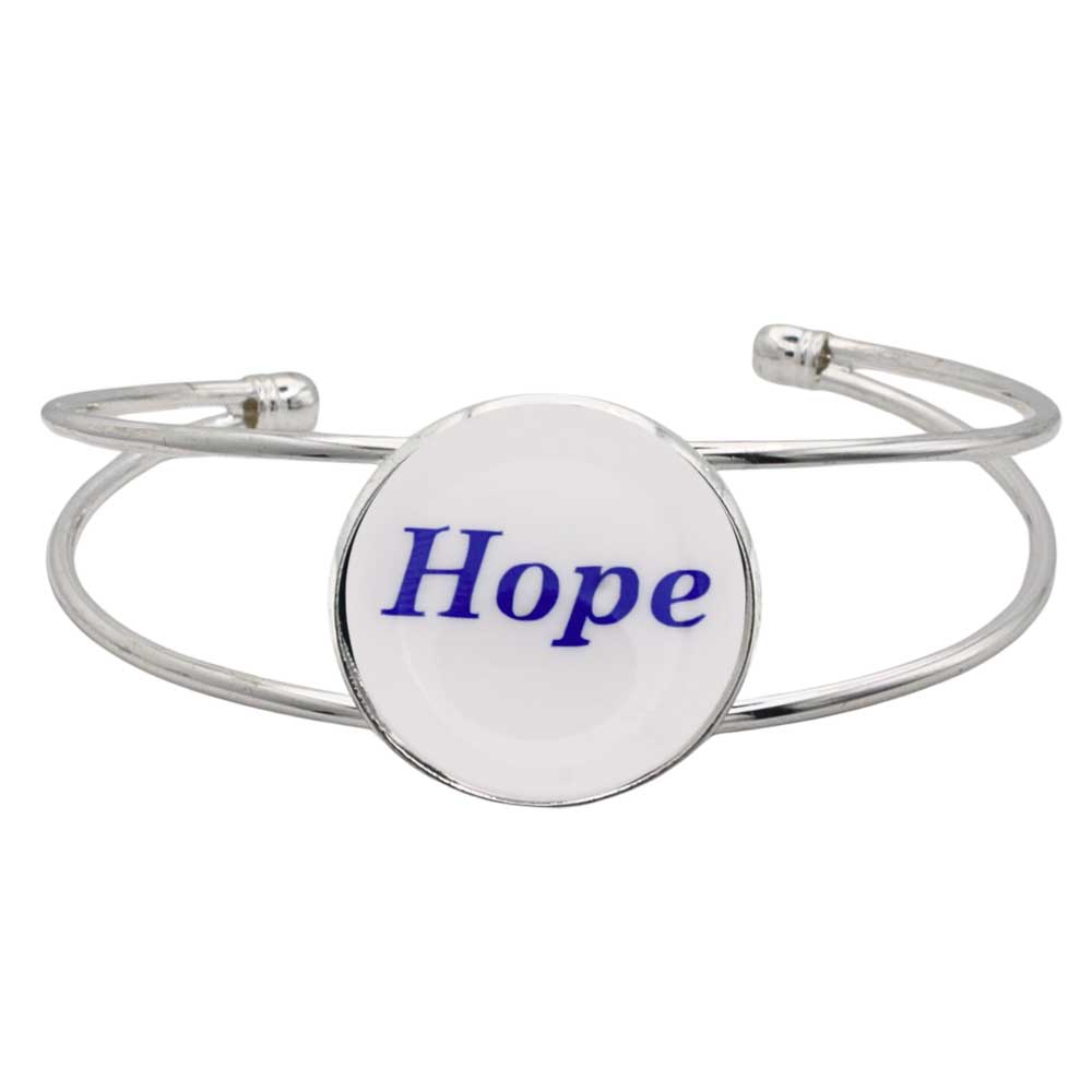 A silver-toned metal cuff bracelet featuring a round white disc with the word “Hope” printed in blue script, shown on a plain white background – Lilylin Designs