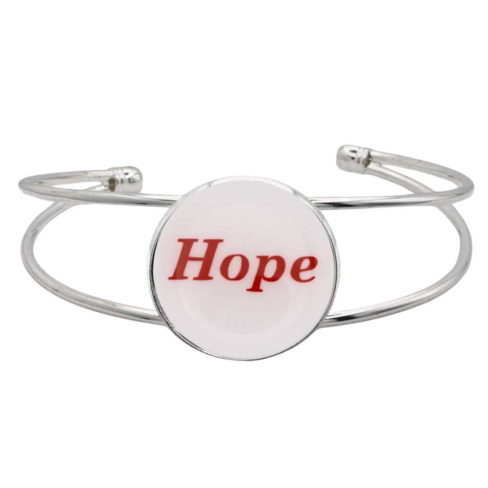 A silver-toned metal cuff bracelet featuring a round white disc with the word “Hope” printed in red script, shown on a plain white background – Lilylin Designs