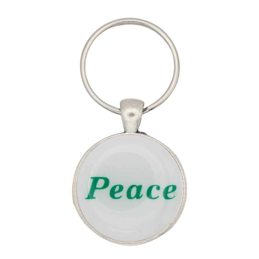 Round white disc with Peace in green keychain and bag charm - Lilylin Designs