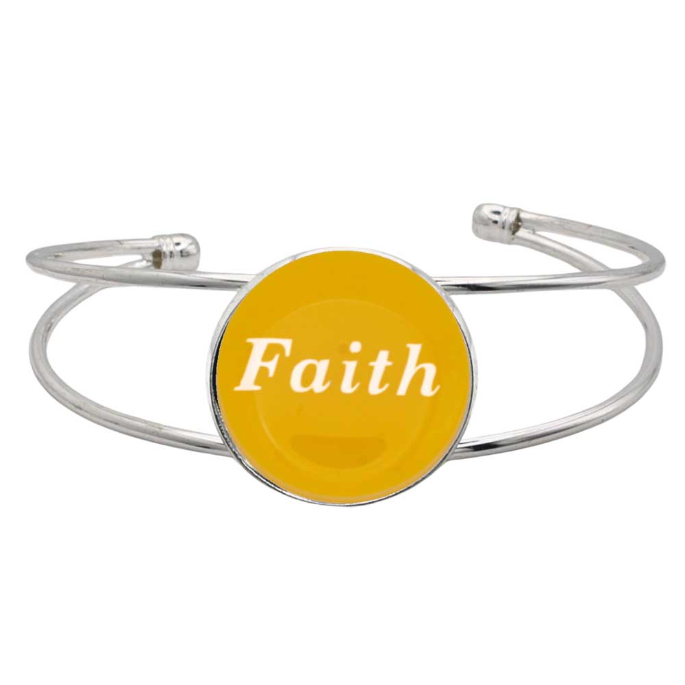 A silver-toned metal cuff bracelet featuring a round yellow disc with the word 'Faith' printed in white script, shown on a plain white background – Lilylin Designs