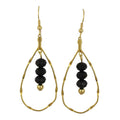 Gold earrings with black beads on a white background - Lilylin Designs