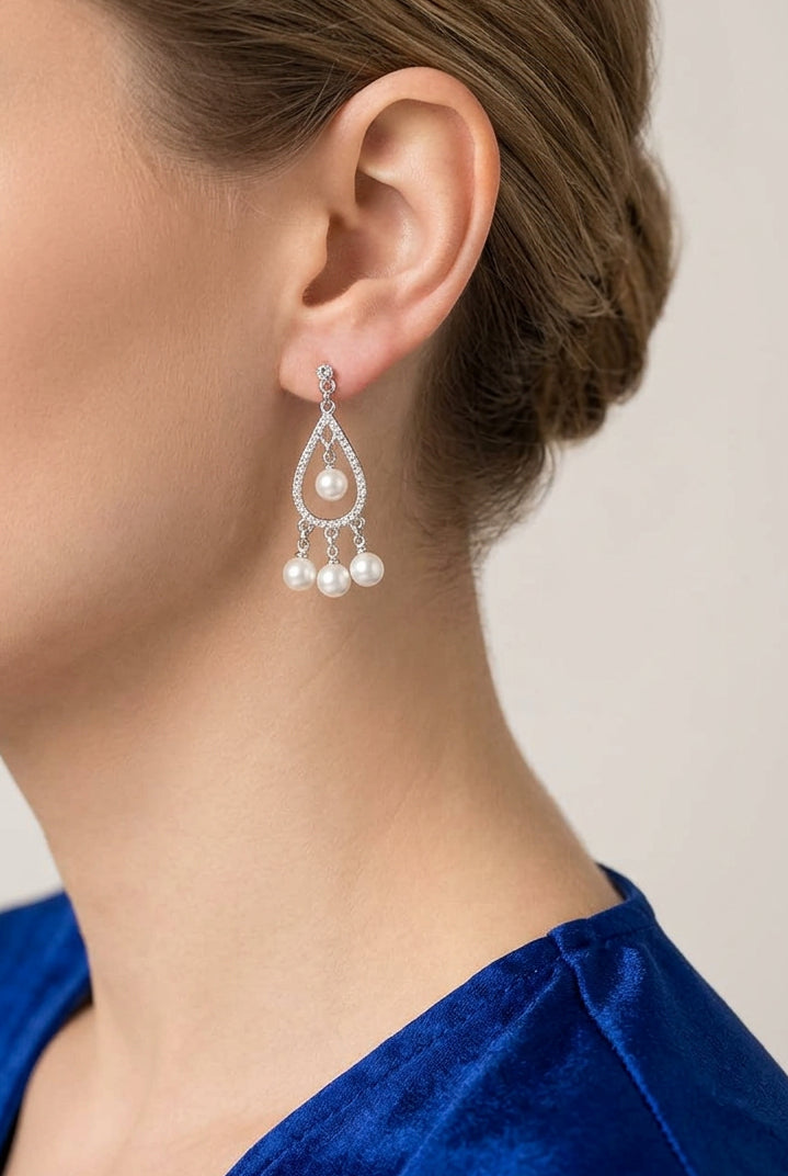Model wearing crystal teardrop with dangling pearl balls pierced earring - Lilylin Design