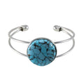 Silver bracelet with a turquoise stone on a white background - Lilylin Designs