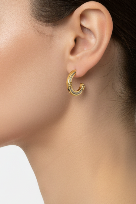Model wearing gold and silver semi hoop earring - Lilylin Designs
