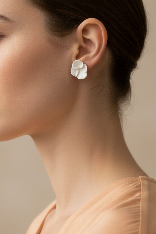 Model wearing white orchid earring - Lilylin Designs