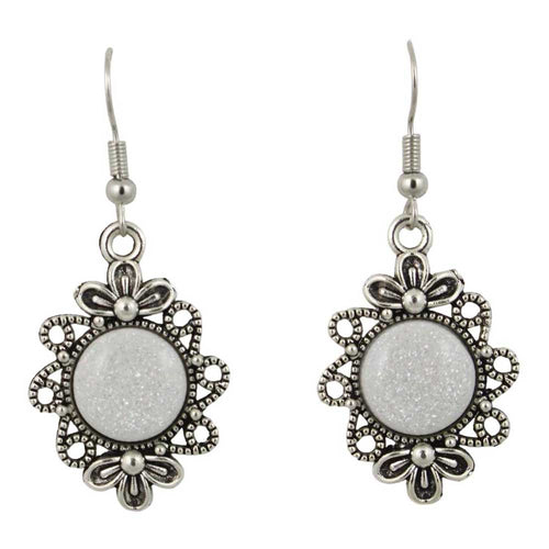 Silver earrings with decorative frames and white central stones on a white background - Lilylin Designs