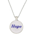 A silver chain necklace with a round pendant featuring the word 'Hope' in blue script on a white background, shown against a plain white backdrop - Lilylin Designs