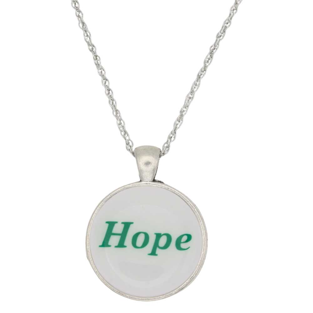 A silver chain necklace with a round pendant featuring the word 'Hope' in green text on a white background, shown against a plain white backdrop - Lilylin Designs