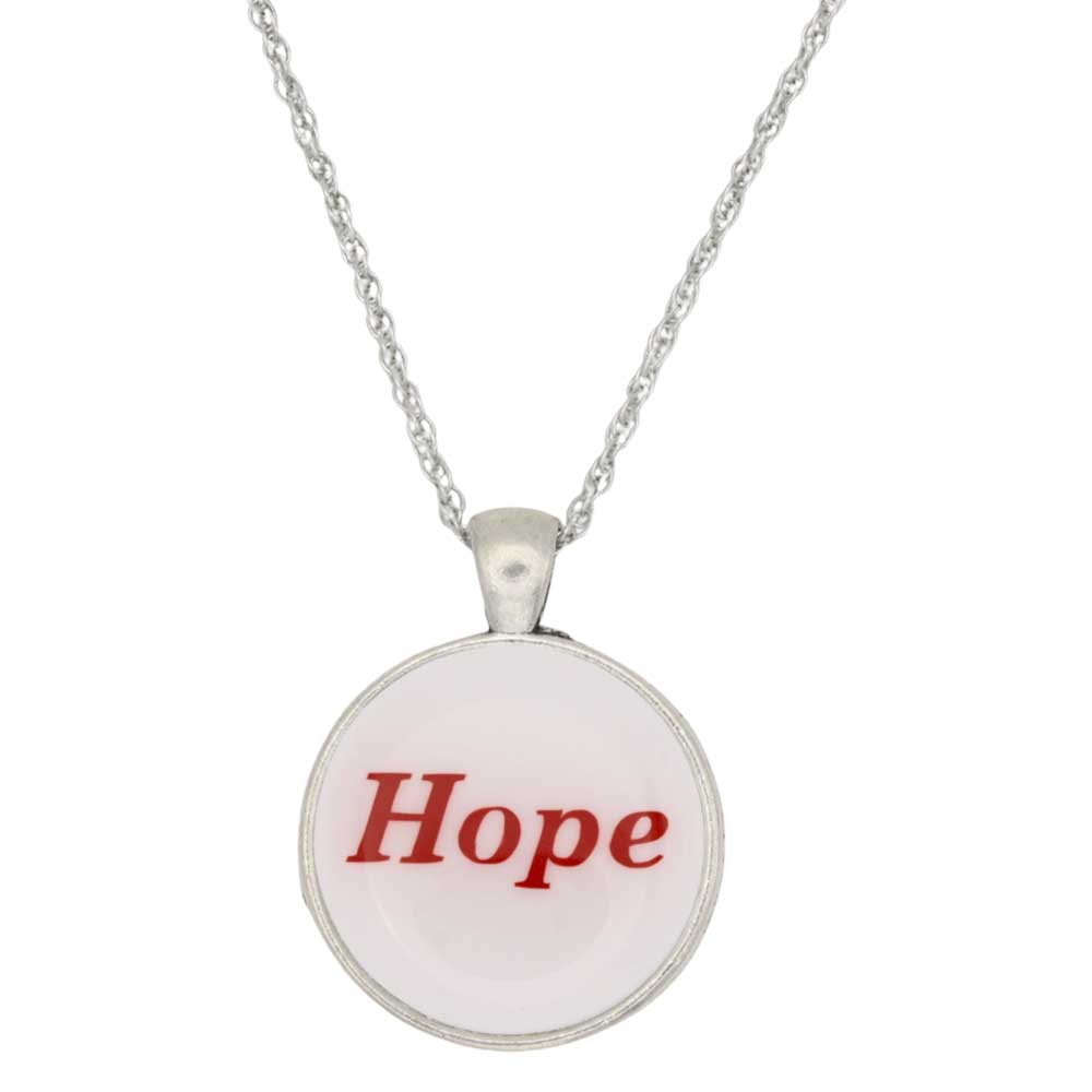A silver chain necklace with a round pendant featuring a pale pink background and the word 'Hope' printed in red serif font, shown on a plain white background - Lilylin Designs