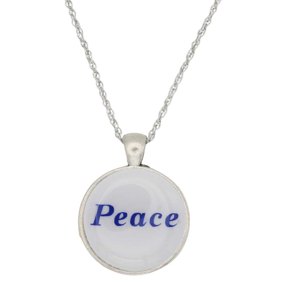 A silver chain necklace with a round pendant featuring the word 'Peace' in blue script on a white background, shown against a plain white backdrop - Lilylin Designs