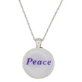 Round white pendant with "Peace" printed in purple on silver-tone chain - Lilylin Designs