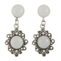 Pair of earrings with white round stones and silver floral designs on a white background - Lilylin Designs
